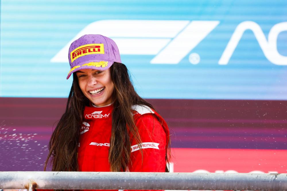 CIRCUIT OF THE AMERICAS, UNITED STATES OF AMERICA - OCTOBER 21: Marta Garcia celebrates winning the F1 Academy Championship on the podium with the trophy during the United States GP at Circuit of the Americas on Saturday October 21, 2023 in Austin, United States of America. (Photo by LAT Images)